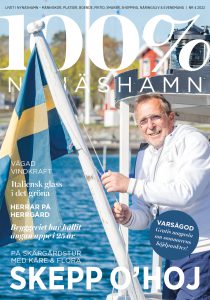 Omslag med Kåre på båten Flora